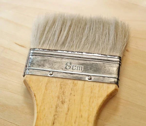 Flat Paint Brush or Decorators Brush on Table — Stock Photo, Image