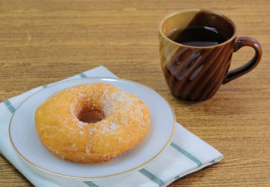 Şeker ile çay servisi ile sırlı Donut