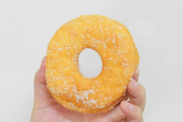 Hand Holding Delicious Glazed Donut with Sugar — Stock Photo, Image