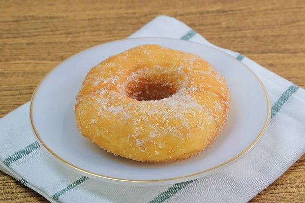 Glazed Donut with Sugar on White Dish — Stock Photo, Image