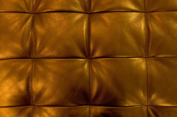 Textura de estofos dourados Padrão de couro Fundo — Fotografia de Stock