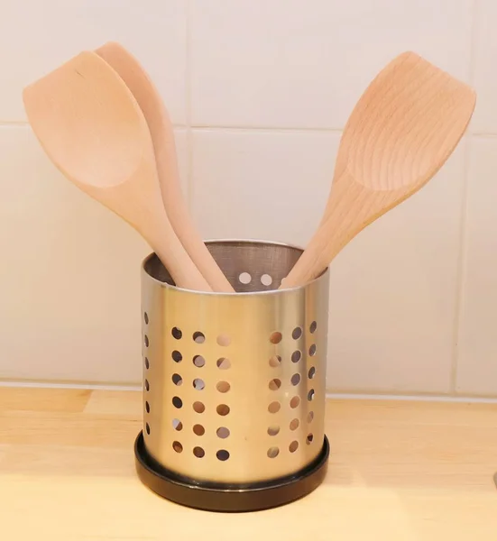 Three Wooden Kitchen Spatula in a Bucket — стоковое фото