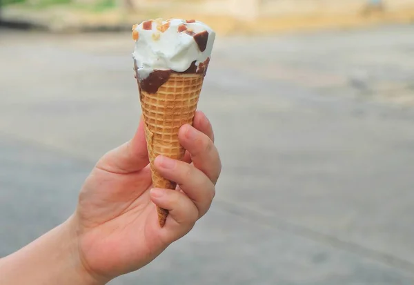 Hand Holding Ice Cream Cones with Chocolate — Stock Photo, Image