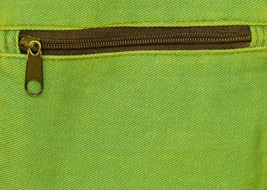 Yakın kadar olan fermuar üstünde yeşil çanta arka plan