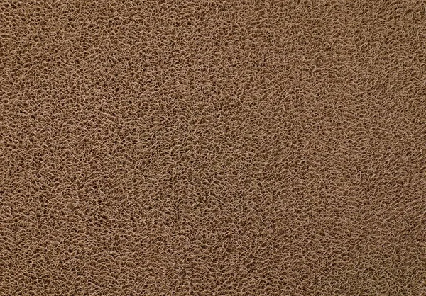 茶色のプラスチック製玄関マットのテクスチャ背景 — ストック写真