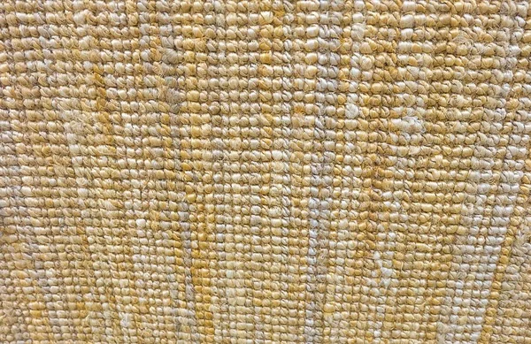 Fundo de textura de um tapete de porta de tecido marrom — Fotografia de Stock