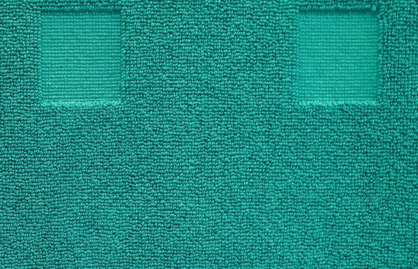 Detail of Teal Cotton Towel Texture Background