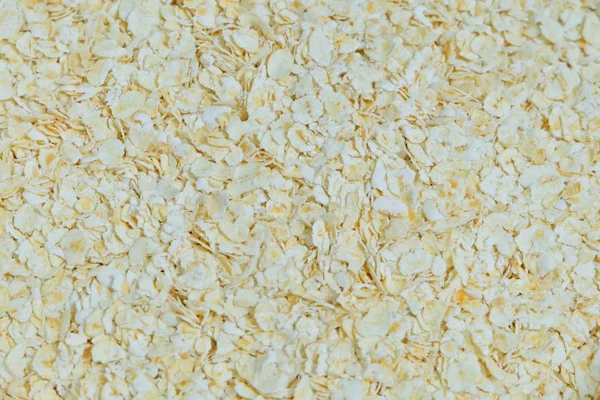 Rolled Oat or Oat Flakes Textured Background