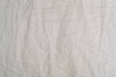 Kumaş dokusu, kapatmak yukarıya-in bej buruşuk Tekstil doku desen arka plan.