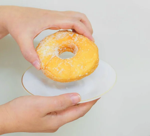 Hand Holding Delicious Glazed Donut with Sugar — Stock Photo, Image