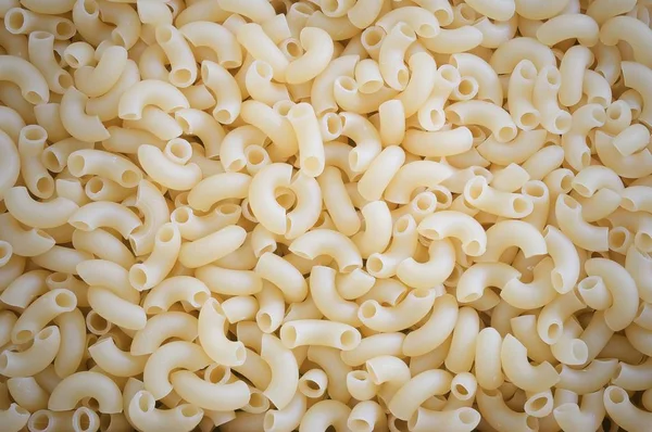 Background of Elbow Macaroni or Gomiti Pasta — Stock Photo, Image