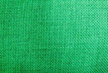 Tekstil doku, kapatmak yukarıya-in yeşil torba ya da çuval bezi kumaş desen arka planda Pastel renkler sesi.