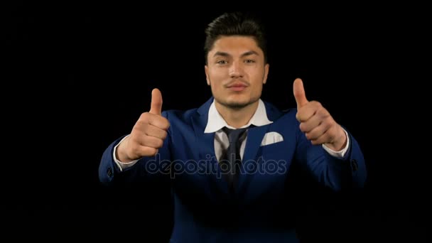 Joyful young business man showing thumbs up — Stock Video