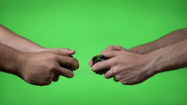 Kablosuz denetleyicisi her yeşil ekran arka plan üzerinde bir maçta karşı karşıya olan iki sinir genç video oyun