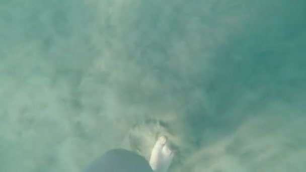 Pov of young female feet walking barefoot in sea enjoying bathing — Stock Video