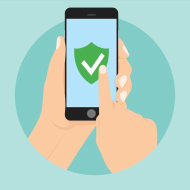 Yeşil kalkan smartphone ekranında. El smartphone tutar ve parmak ekran dokunur.
