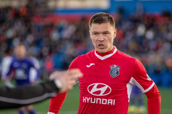 MINSK, BELARUS - 7 DE ABRIL DE 2018: Sergey Turanok portero de Isloch grita durante el partido de fútbol bielorruso de la Premier League entre el FC Dynamo Minsk y el FC Isloch en el Estadio FC Minsk — Foto de Stock