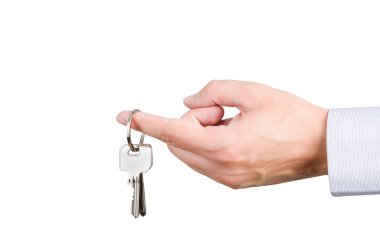 Tuşları ile yeni evine tutan adam el