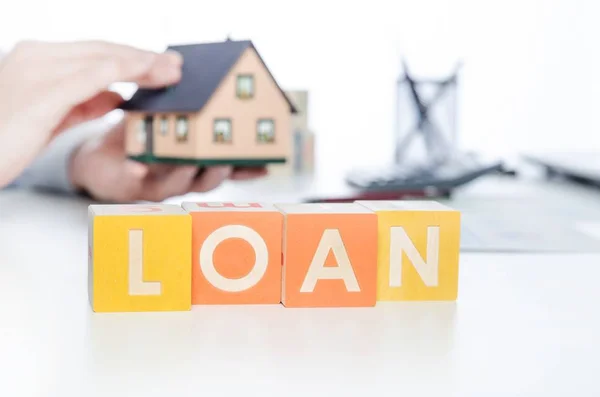 LOAN parola con blocchi colorati — Foto Stock