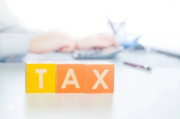 Tax word with colorful blocks — Stock Photo, Image