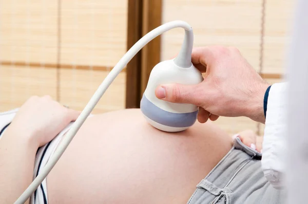 Doctor holding ultrasound transducer. USG machine closeup — Stock Photo, Image