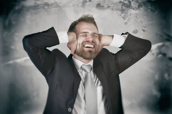 Businessman hate his work, screaming and covering his ears — Stock Photo, Image