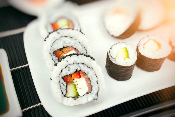 Homemade sushi on plate