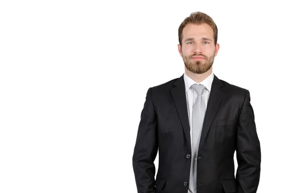 Retrato de jovem empresário de pé em estúdio — Fotografia de Stock