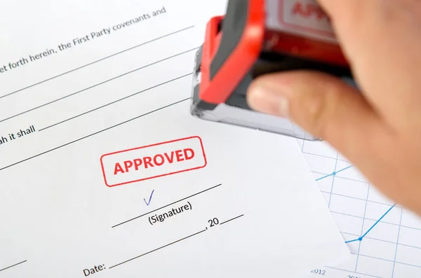 Automatic stamp on the contract document — Stock Photo, Image