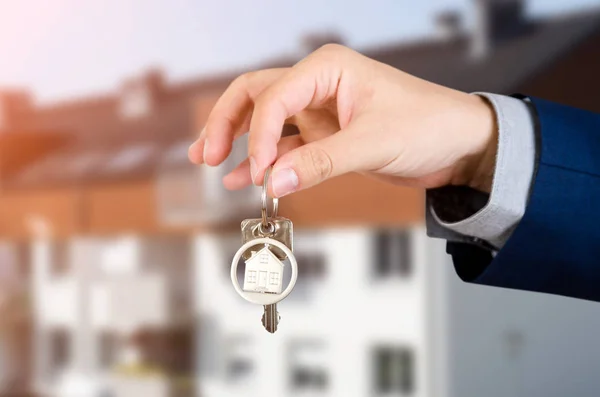 Real estate agent with home keys — Stock Photo, Image