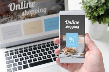 Akıllı telefon ve dizüstü online alışveriş kavramı