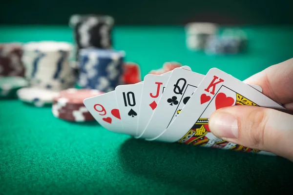 Man plays poker in the casino — Stock Photo, Image