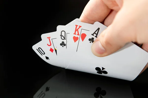 Man playing poker in casino — Stock Photo, Image