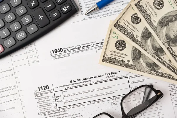 US tax form on desk composition — Stock Photo, Image