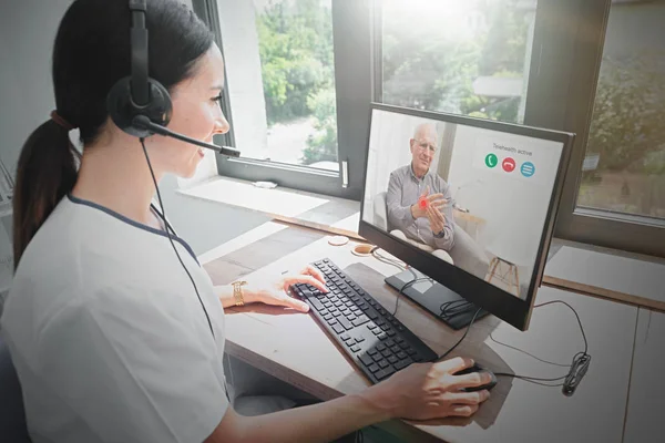 Doctor and senior man patient, telehealth — Stock Photo, Image