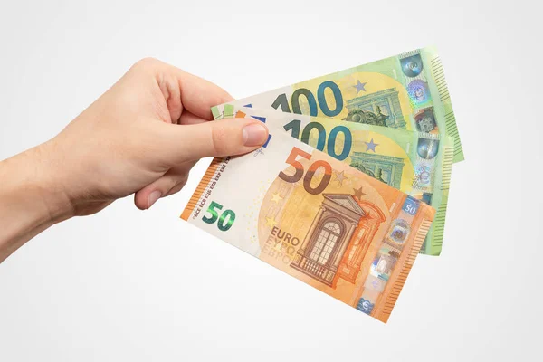 Banconote in euro in possesso della mano su sfondo bianco — Foto Stock