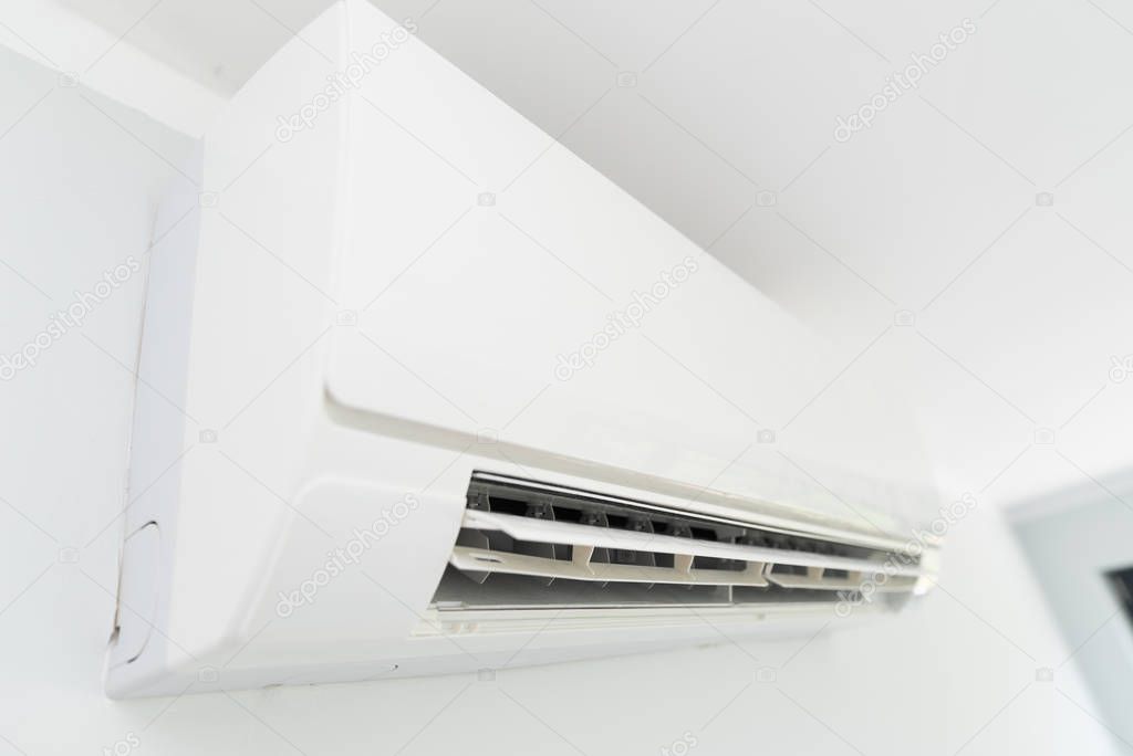 Air conditioner system on white wall room