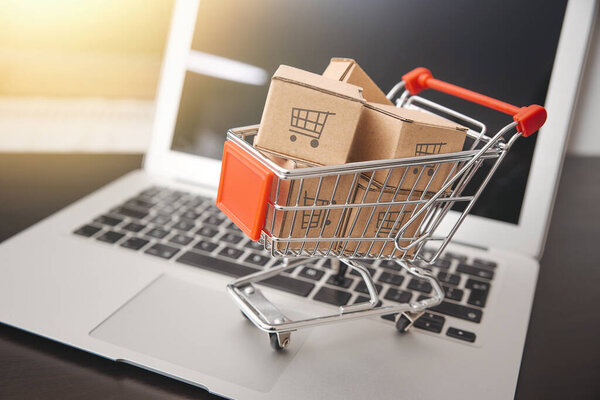 e-commerce, shopping trolley with paper boxes