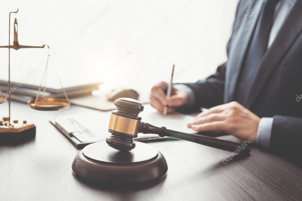 Lawyer, attorney with gavel working in the office. Legal, law concept
