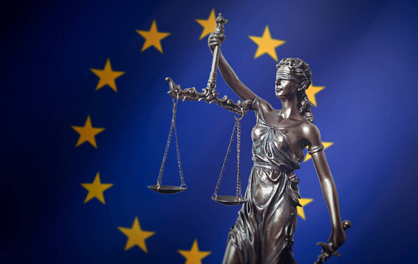 Law, legal, judge concept. Lady justice with European Union flag in background