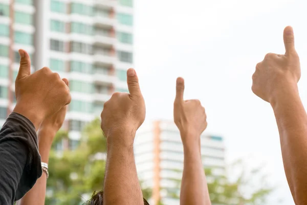 A bunch of raised thumb of people — Stock Photo, Image