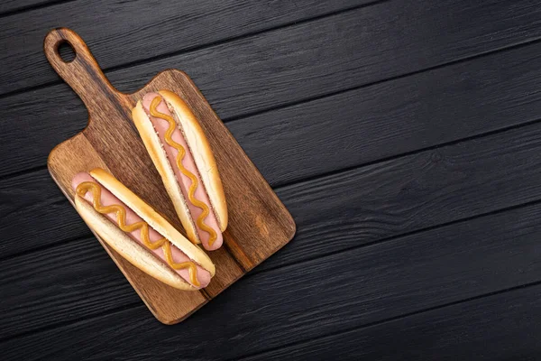 Hot Dogs Mustard Wooden Board Hot Dogs Served Black Table — ストック写真