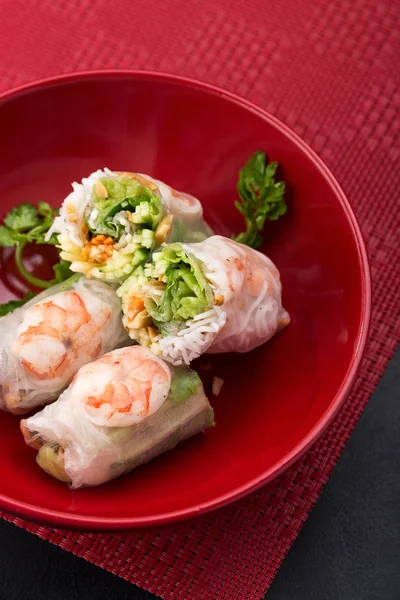 Fresh Vietnamese, Asian, Chinese food. Spring rolls rice paper, lettuce, salad, sweet chili, soy, lemon. Vietnamese spring rolls. Asian and thai food. Traditional national cuisine