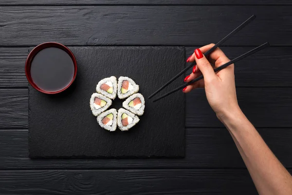 Woman Holds Sushi Chopsticks Young Woman Holding Sushi Chopsticks Isolated — Stock Photo, Image