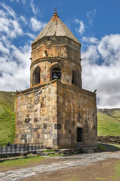 Gergeti Trinity Church, old bell tower in Georgia — Stock Photo, Image