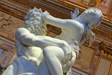 Rome, Italy - January 25: detail of baroque marble sculptural group by Italian artist Gian Lorenzo Bernini, Rape of Proserpine on January 25, 2018, Galleria Borghese, Rome, Italy clipart