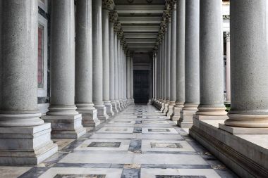 colonnade of papal Basilica of St. Paul outside the Walls in Rome, Italy clipart