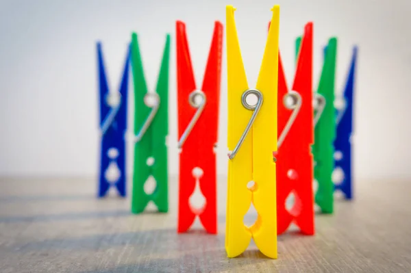 Clothespins lined up in a row — Stock Photo, Image