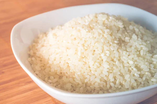 Raw rice in a plate