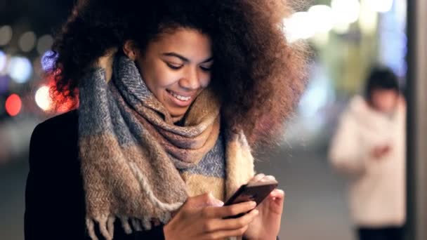 Young Woman Holding Smartphone Street Looking Texting Video Clip
